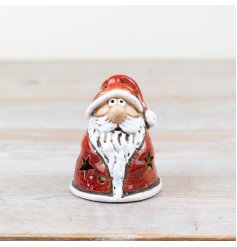 A characterful Santa ornament with a rich reactive glaze and matte finish. Hand finished and with warm glow lights.