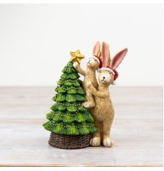 A stunning and unique festive ornament featuring Jasper rabbit and Bonnie rabbit decorating the Christmas tree. 