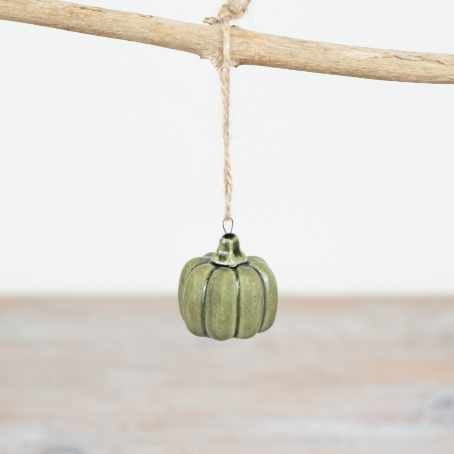 Enhance your Halloween decor with our Green Pumpkin Jute Hanger, perfect for creating a rustic and charming atmosphere.