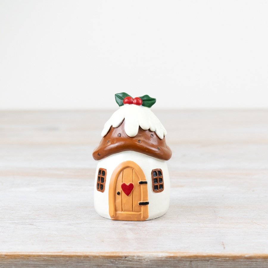 Add a charming touch to your festive collection with this delightful Christmas pudding house ornament. 