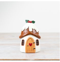 Add some festive cheer to the home with this delightful Christmas pudding house ornament.