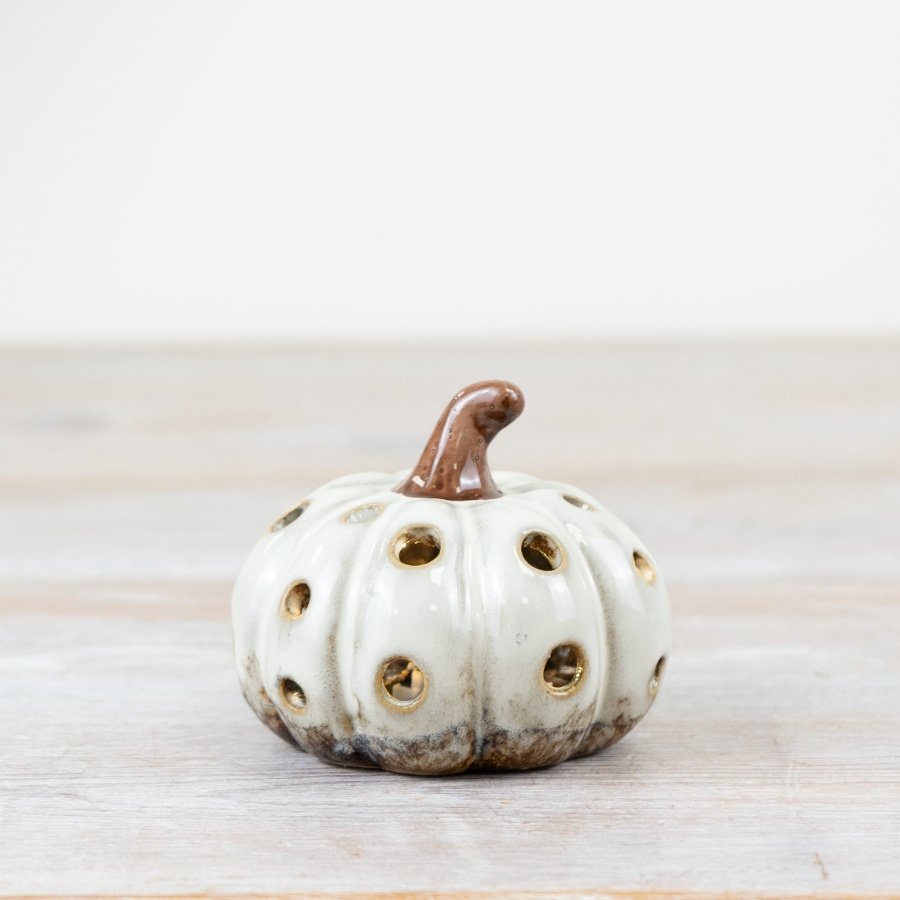 Liven up your home with a charming light-up pumpkin for a spooky touch!