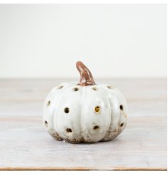 Add an enchanting glow to your home with our LED Pumpkin Ornament. 