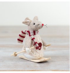 A chic felt mouse decoration with wooden skis, a red stitched heart and knitted scarf.