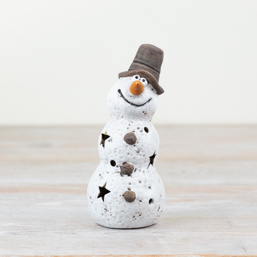 A rustic, hand crafted snowman ornament with led lights. Beautifully textured and finished with a matte glaze.