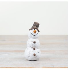 A rustic, hand finished snowman ornament. With a matte finish and quirky details this is a must have seasonal item. 
