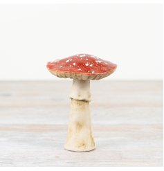 Add a touch of woodland magic to your home decor with the charming Woodland Red & White Mushroom. 
