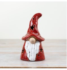 A rustic gonk ornament. Hand crafted and finished with a richly coloured red reactive glaze.