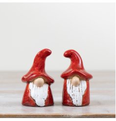 An assortment of 2 hand finished gonk figures with a rich red reactive glaze. Hand crafted with plenty of character
