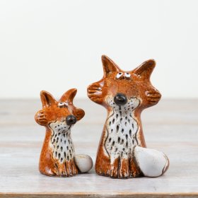 Enhance your home decor with our adorable Fox Ornament, perfect for adding a rustic touch to any space.
