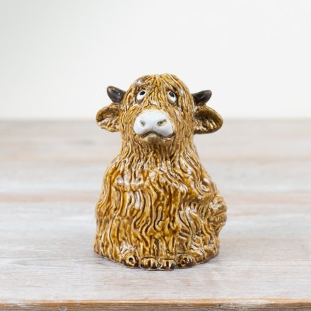 Add character and country charm to the home with this unique hand finished highland cow ornament. 