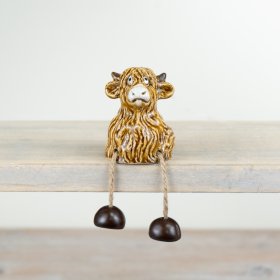 Add character and charm to the home with this rustic, hand finished highland cow sitter.