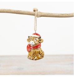 Add festive cheer to the home with this quirky and original highland cow hanger. Complete with hat and scarf.