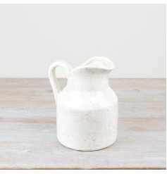 Elevate your home decor with our chic Terracotta Jug, combining rustic charm and elegance in one eye-catching piece.