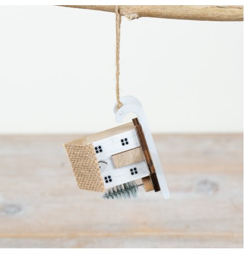 Elevate your home's style with our charming Hanging Wooden House, featuring rustic details.