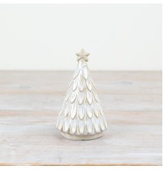 Elevate your holiday decor with our Porcelain Tree with Star - the perfect festive accent to deck the halls!