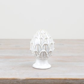 Decorate your home with our elegant porcelain pine cone ornament, adding festive charm to any space. 
