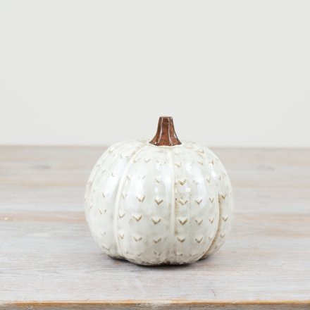 Add a touch of sophistication to your space with our charming Pumpkin figurine.