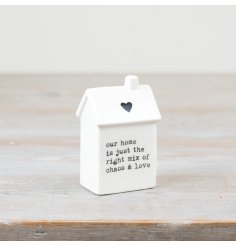Add charm to the home with this delicate white house ornament, adorned with elegant script and a petite grey heart.