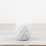 A sweet 10cm t/light holder in the shape of a pinecone.