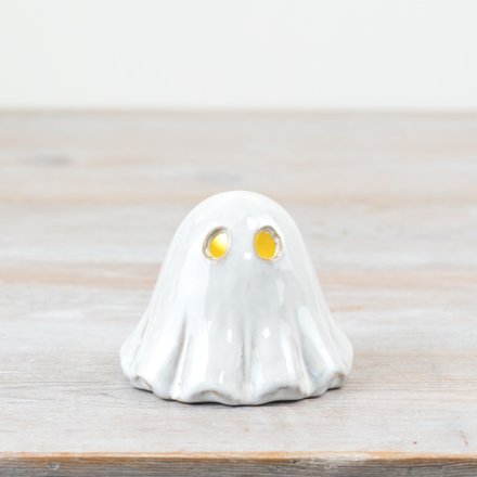 Get ready to spook up your space with this white light up ghost deco 