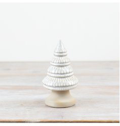 A natural glazed porcelain tree ornament on a unglazed base complete with a delicate pattern. 