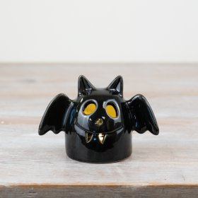 Add a charming touch to your space with our glowing LED Bat, Owl, and Ghost decorations