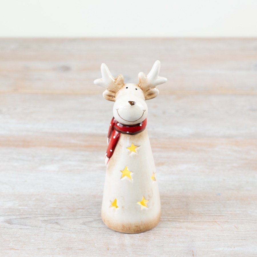 A charming LED reindeer ornament, complete with a delightful red polka dot scarf and a natural finish