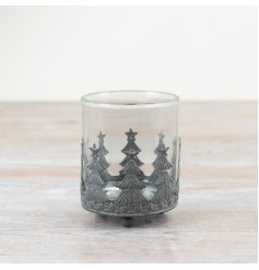 A rustic t-light holder pot featuring a rustic Christmas tree design.