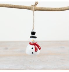 Spruce up your tree with this glazed snowman hanging decoration for a classic touch.