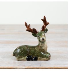 Add some elegance and natural charm to any space with our durable dolomite deer figurine