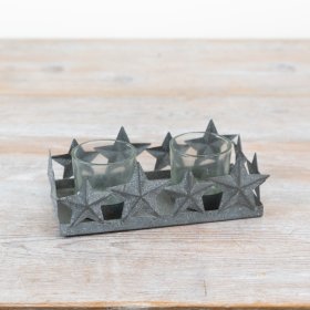 Introduce a touch of vintage elegance to the home with this charming t-light holder crafted from rustic metal.