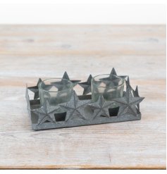 Introduce a touch of timeless charm into the home with this rustic metal star t-light holder.