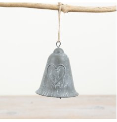 Introducing a classic metal bell featuring a beautifully embossed heart design and a jute string.