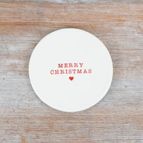 A charming ceramic coaster featuring an embossed "Merry Christmas" in a striking red font 