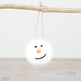 Add a festive touch to your decor with our darling Felt Snowman Ball. Perfect for decking the halls this holiday seaso