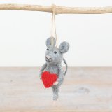 A dainty hanging decoration in a grey mouse design holding a bright red heart. 