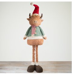 Introducing a delightful tall highland cow decoration with extendable legs. 