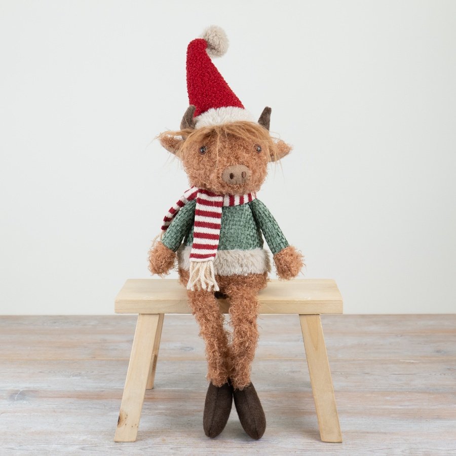 Meet the festive Highland Cow - tough and adorably charming.