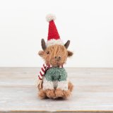 Meet our charming highland cow figurine - the perfect blend of country charm and quality fabric.