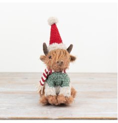 Meet our charming highland cow figurine - the perfect blend of country charm and quality fabric.