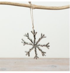 Add a touch of elegance to your holiday display with this stylish snow flake deco 
