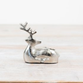 Illuminate your holiday celebration with our beautiful Reindeer Candle Holder.