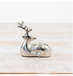 Light up your holiday spirit with our stunning Reindeer Candle Holder. 