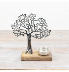 Add a natural touch to your décor with our tree-inspired candle holder. 