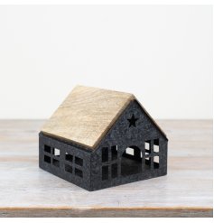 A stunning rustic iron house with a wooden roof and cut-out windows