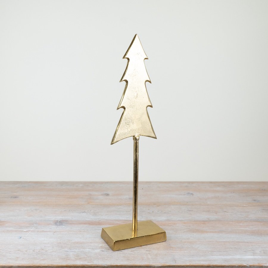 Add a touch of rustic luxury to any home this holiday season with this stunning gold metal tree.