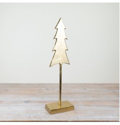 A stunning gold metal tree complete with a rustic finish and gold stand