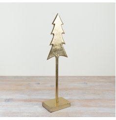 A stunning tall gold metal tree on a stand. 