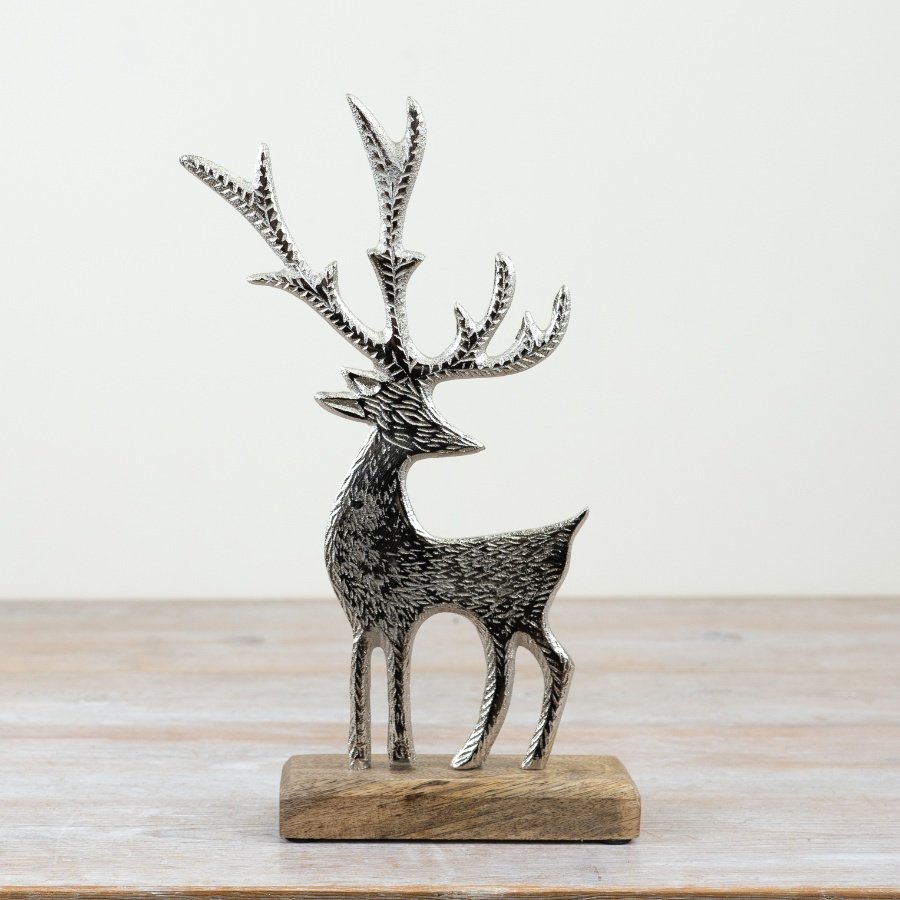 Introducing a stunning rustic Reindeer set on a sturdy wooden block - perfect for adding charm to your festive decor! 